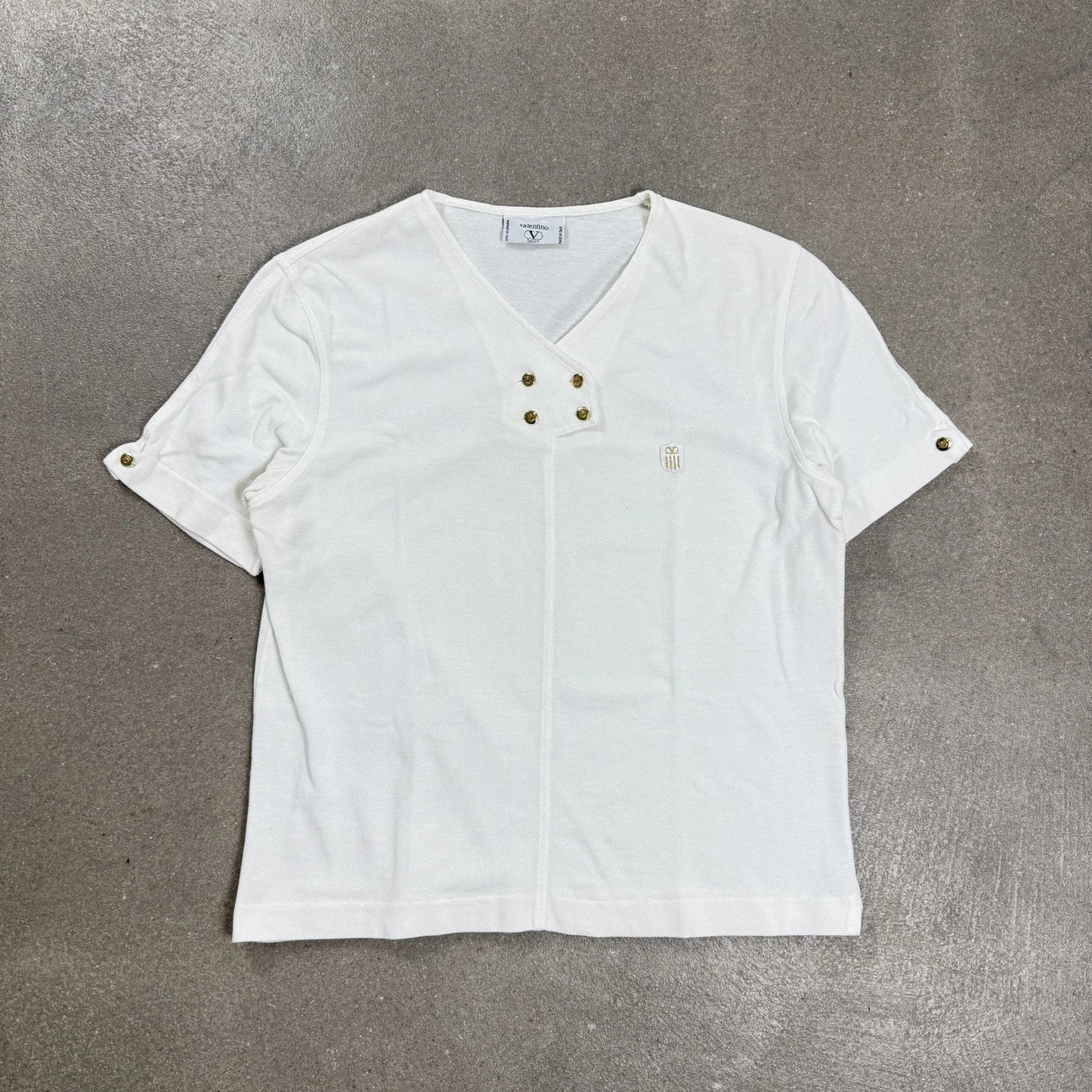 Polo Valentino Sport vintage anni 70 d'archivio bianca con scollo a V e bottoni dorati goffrati