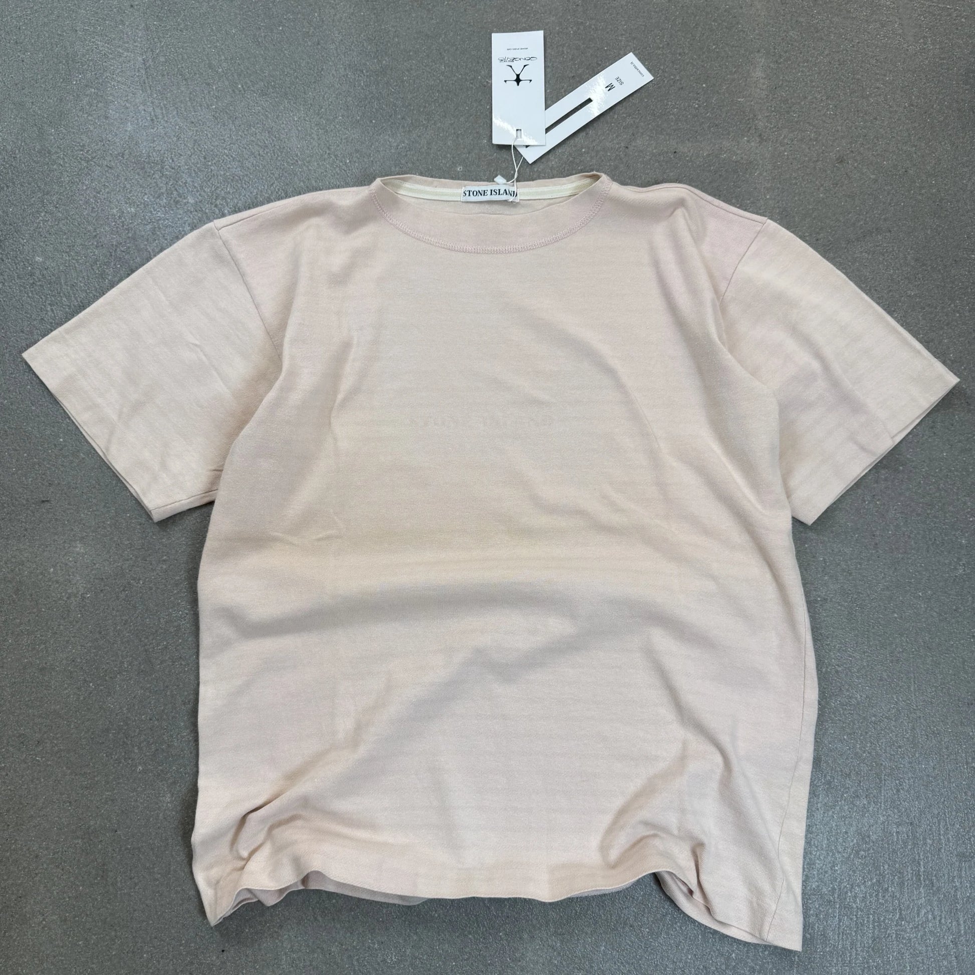 T-shirt Stone Island d'archivio vintage anni 80 era Massimo Osti in cotone rosa cipria con etichetta CP Company taglia M